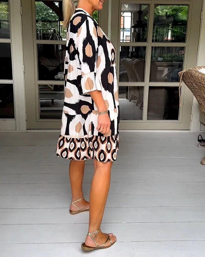 Trendy short-sleeved dress with abstract print & loose fit – Liora-Brown-S-The Livary