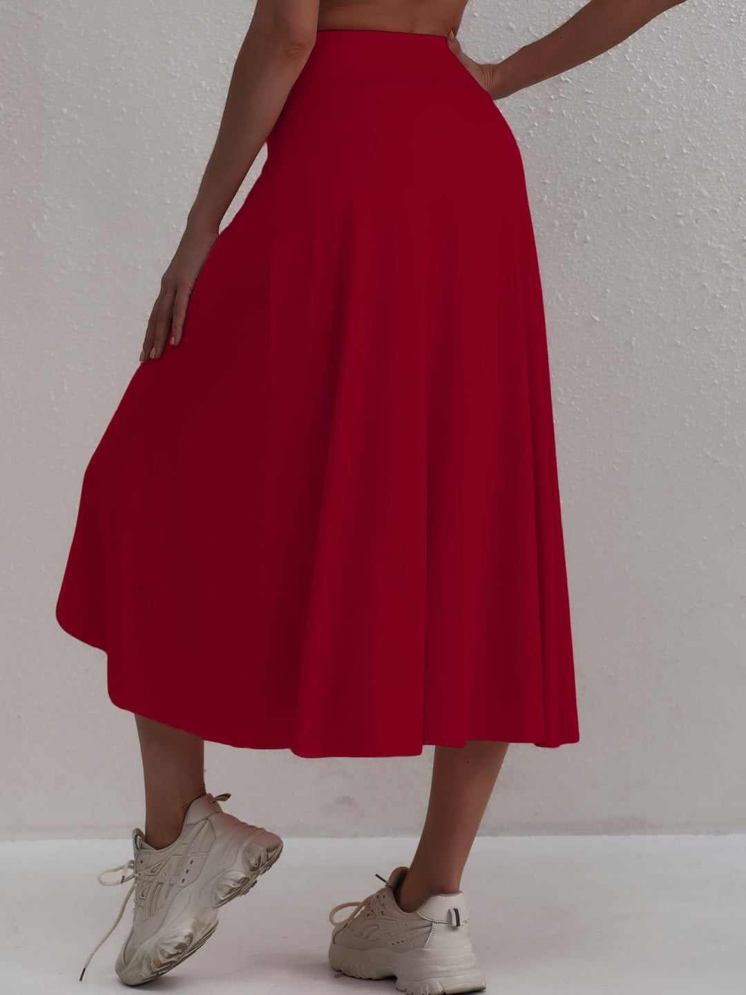 Sporty women's skirt with a high waistband & asymmetric cut – Alexia-Coral-S-The Livary