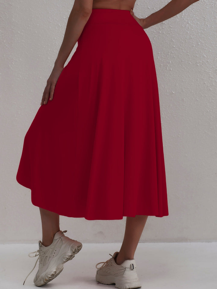 Sporty women's skirt with a high waistband & asymmetric cut – Alexia-Coral-S-The Livary