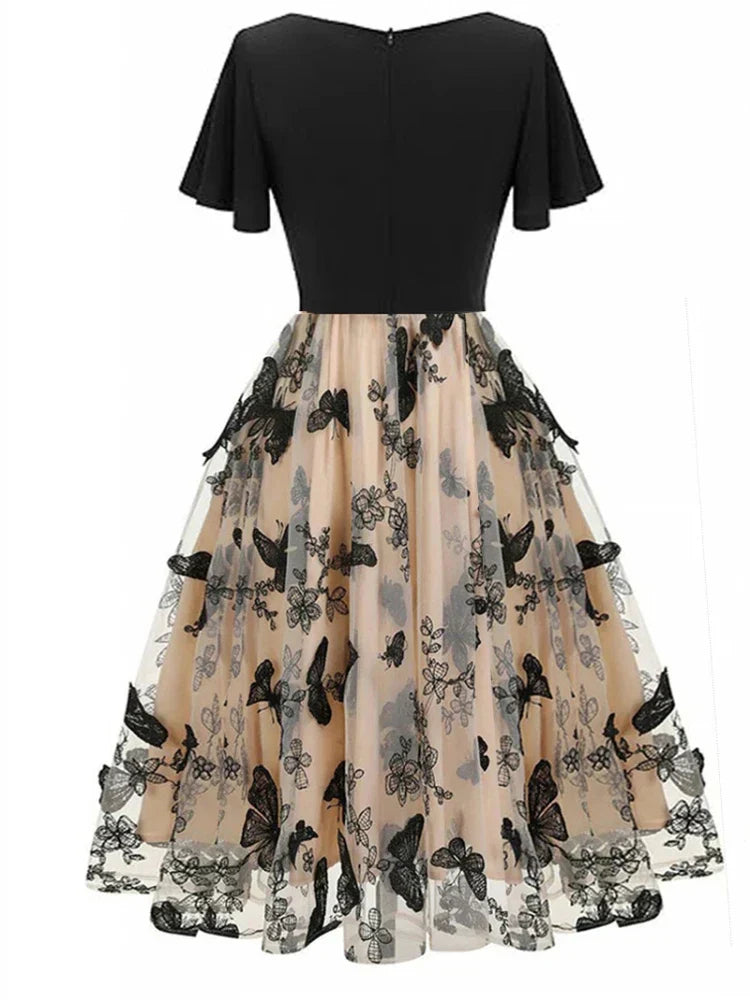 Stylish midi dress made of mesh with embroidery & flounce sleeves – Maila-S-The Livary