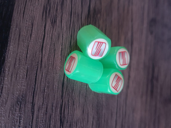 Set of 4 Glow-in-the-Dark Valve Caps with Logo – LuxaGlow-Seat-The Livary