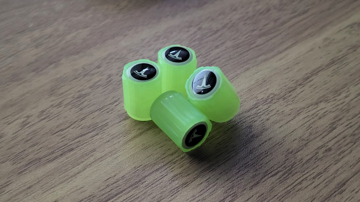 Set of 4 Glow-in-the-Dark Valve Caps with Logo – LuxaGlow-Tesla-The Livary