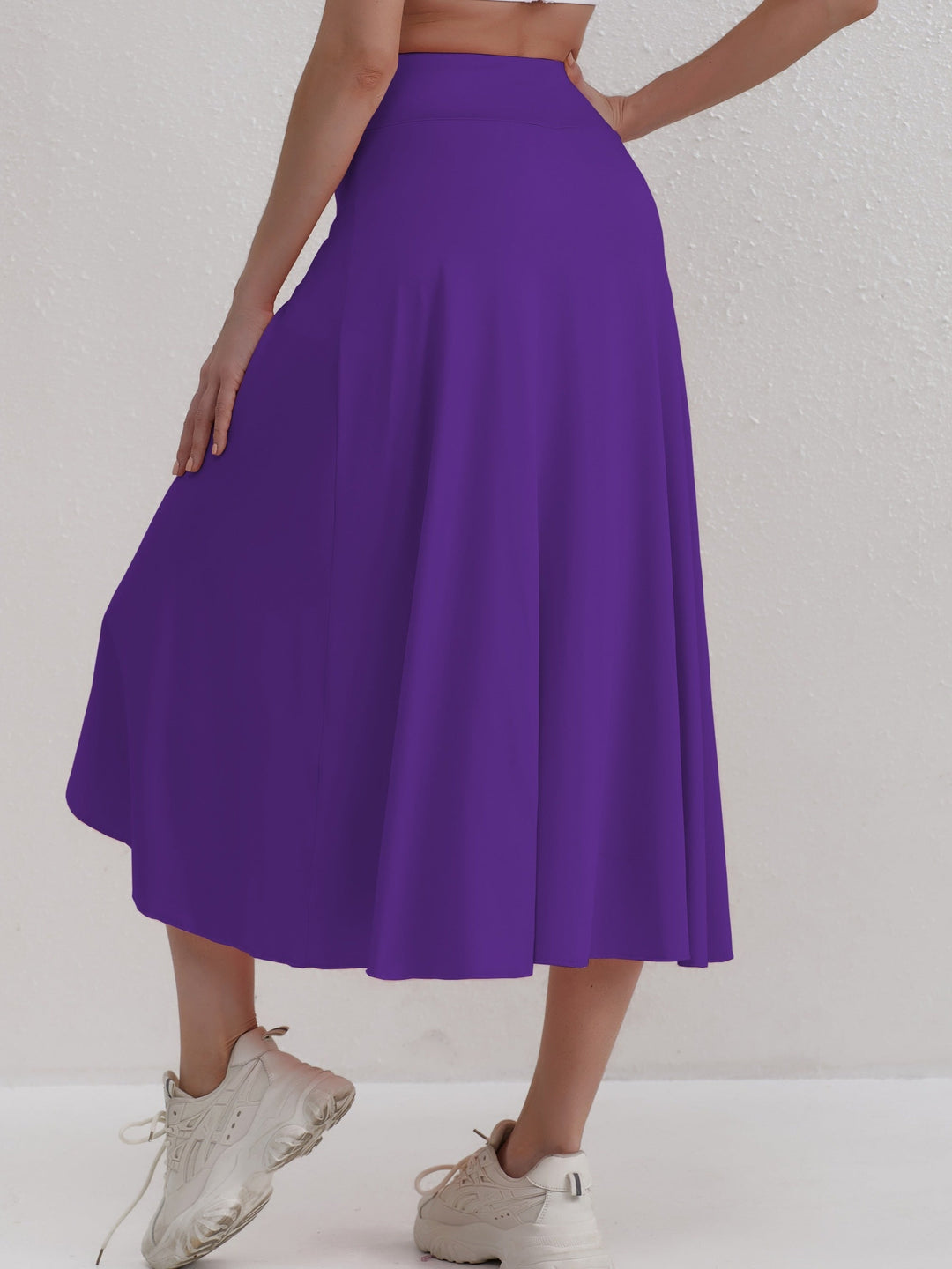 Sporty women's skirt with a high waistband & asymmetric cut – Alexia-Coral-S-The Livary