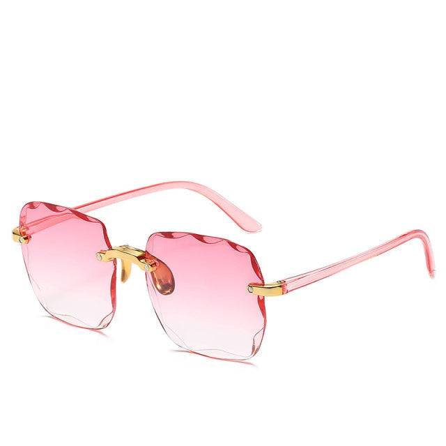 Trendy Rimless Sunglasses with UV400 Protection in Vintage Style – Clea-Pink-The Livary